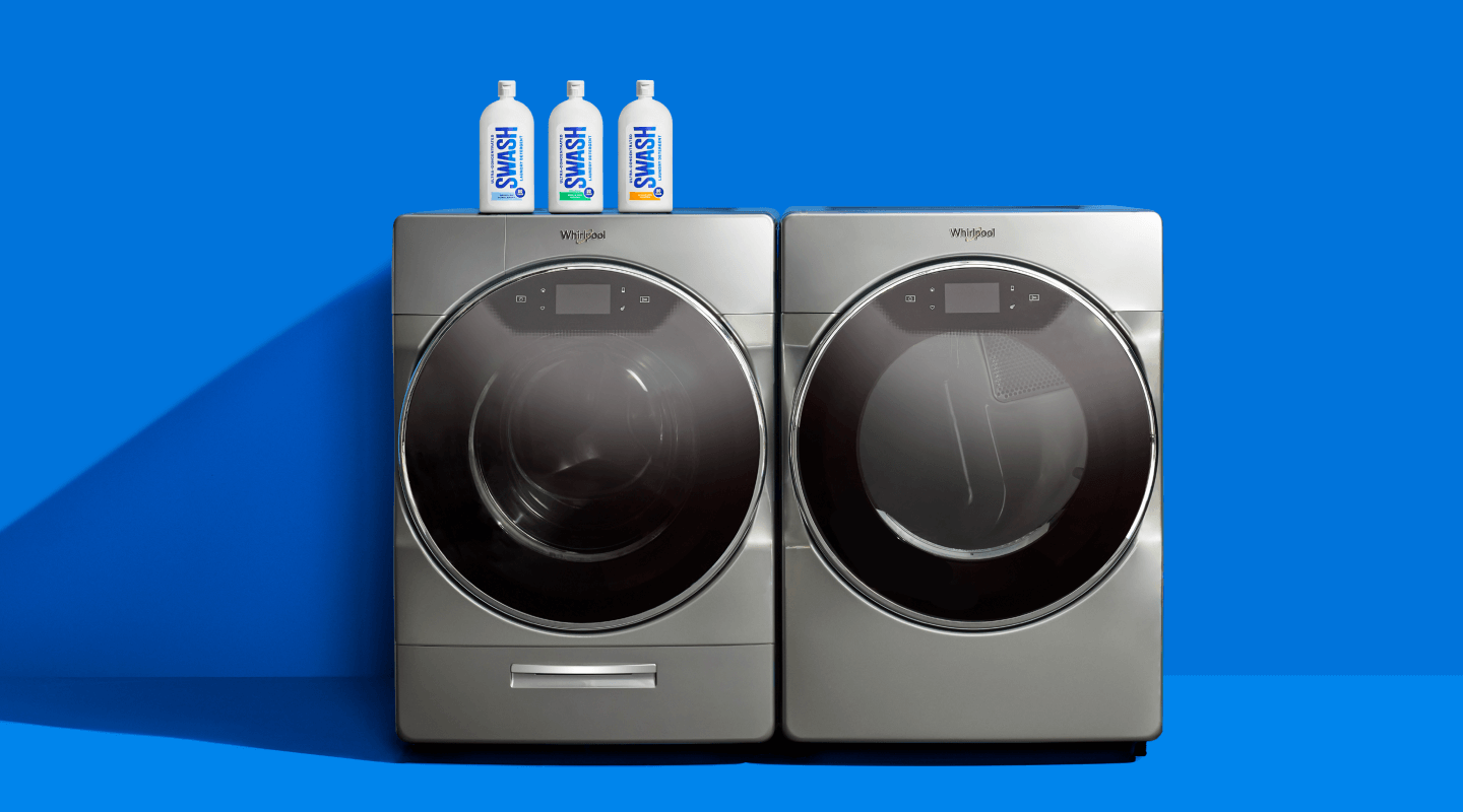 Three bottles of Swash® Laundry Detergent sitting on top of a Whirlpool laundry pair Three bottles of Swash® Laundry Detergent sitting on top of a Whirlpool laundry pair