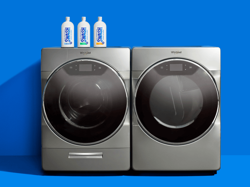 Three bottles of Swash® Laundry Detergent sitting on top of a Whirlpool laundry pair Three bottles of Swash® Laundry Detergent sitting on top of a Whirlpool laundry pair