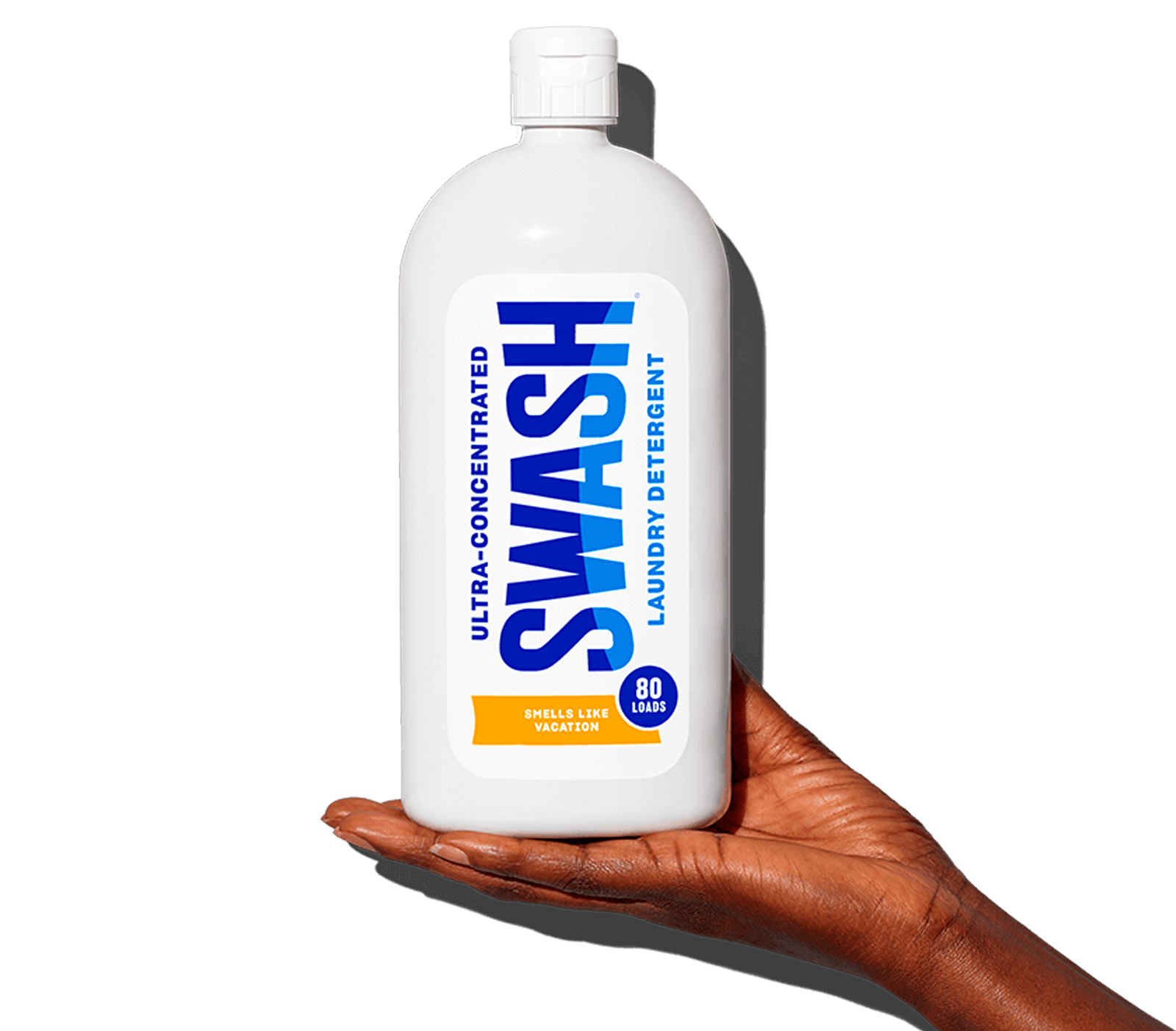 Swash® Laundry Detergent Smells Like Vacation being held in palm of hand