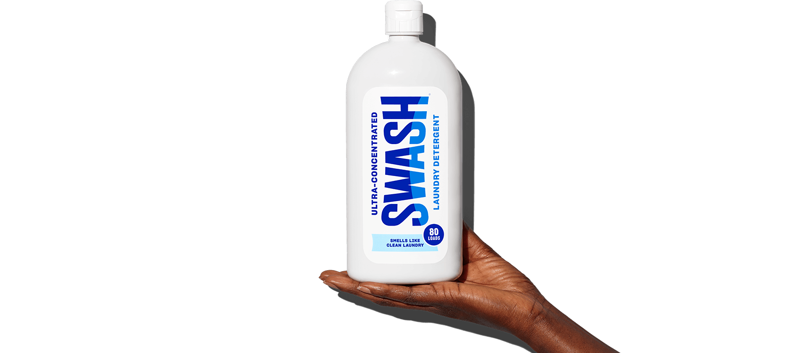 Swash® Laundry Detergent Smells Like Clean Laundry being held in palm of hand Swash® Laundry Detergent Smells Like Clean Laundry being held in palm of hand